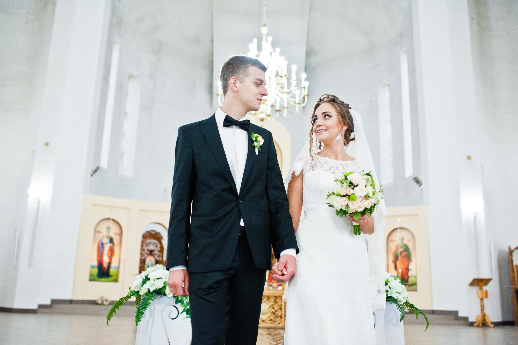 Wedding couple in love at church